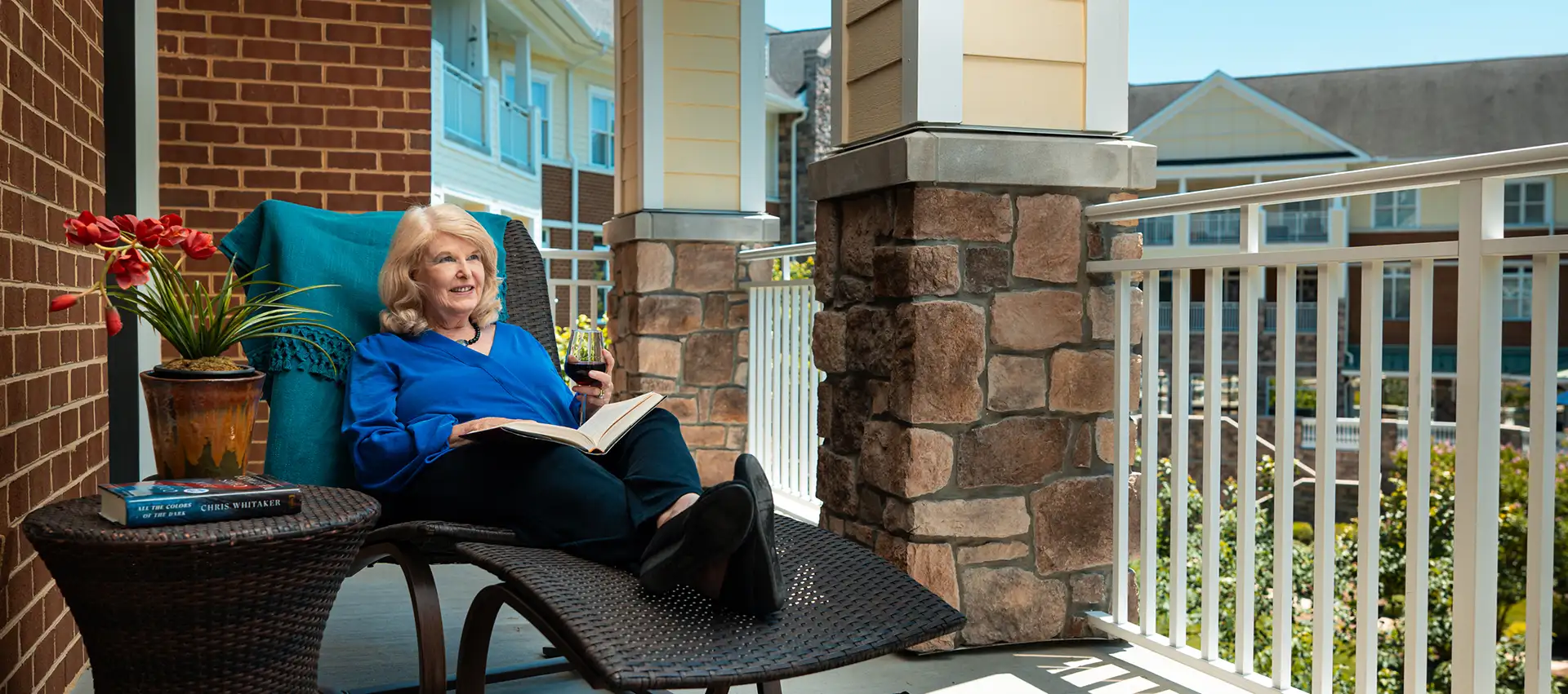 Covenant Woods resident relaxing on the patio